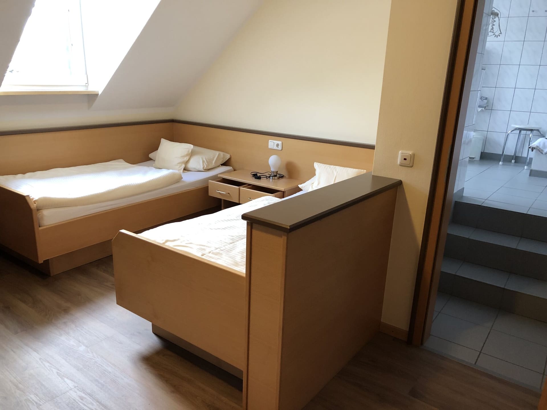 Family room with children's beds and bathroom at Landhaus Schend